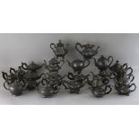 A COLLECTION OF TWENTY-FOUR PEWTER TEAPOTS.