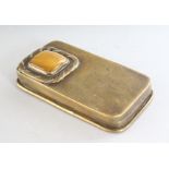 A BRASS RECTANGULAR SNUFF BOX with inset hardstone top. 3.25ins.