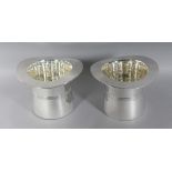 A PAIR OF SILVER PLATE TOP HAT WINE COOLERS. 7ins high.