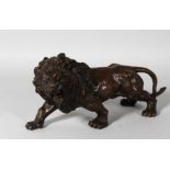 AFTER BARYE A BRONZE LION. 13ins long.
