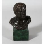 A BRONZE GRAND TOUR BUST on a marble plinth. 7ins overall.
