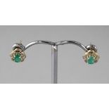 A PAIR OF 9CT GOLD EMERALD EARRINGS.