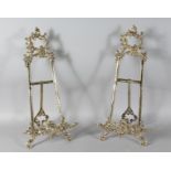 A GOOD LARGE PAIR OF BRASS EASELS. 20ins high.