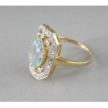 A 9CT GOLD, BLUE TOPAZ AND DIAMOND DECO STYLE RING.