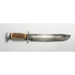 A GERMAN BOWIE TYPE KNIFE, with stag horn grips, the blade stamped ANTON WINGEN, SOLINGEN,