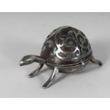 A RARE SILVER MOUNTED TORTOISESHELL "TORTOISE" SHAPED CLOCK, the lid opens to reveal the watch