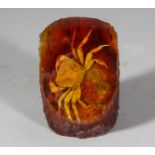 A PIECE OF AMBER with a crab. 4ins high.