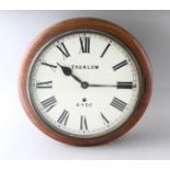 A VICTORIAN MAHOGANY CIRCULAR WALL CLOCK by THURLOW, RYDE. Dial: 11ins diameter.