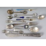 A BAG OF SILVER CUTLERY, butter knife, spoons and forks.