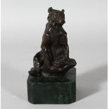 L. CARDIN A BRONZE BEAR on a marble plinth. 6.5ins overall.