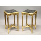 A GOOD PAIR OF GOLD SQUARE TOP TABLES with marble tops. 28ins high.