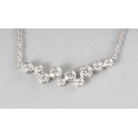 AN 18CT WHITE GOLD AND DIAMOND (0.45cts) BUBBLE STYLE NECKLACE.