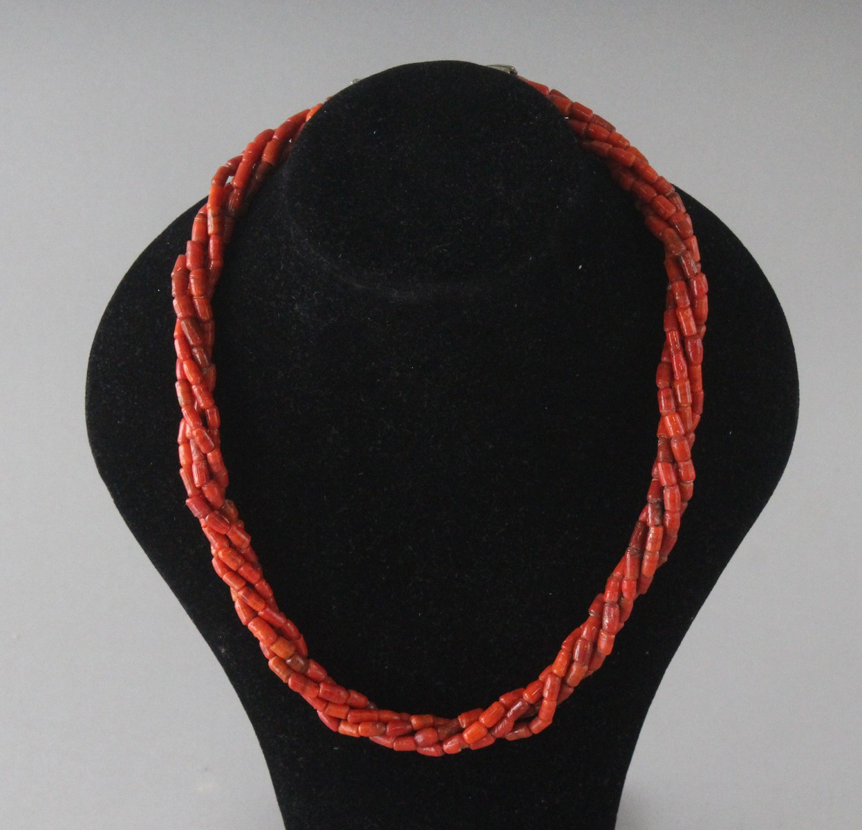 A CORAL NECKLACE.