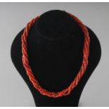 A CORAL NECKLACE.