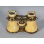 AN IVORY CASED PAIR OF OPERA GLASSES. 2.25ins, closed.