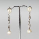 A PAIR OF 18CT WHITE GOLD, DIAMOND AND PEARL DROP EARRINGS.