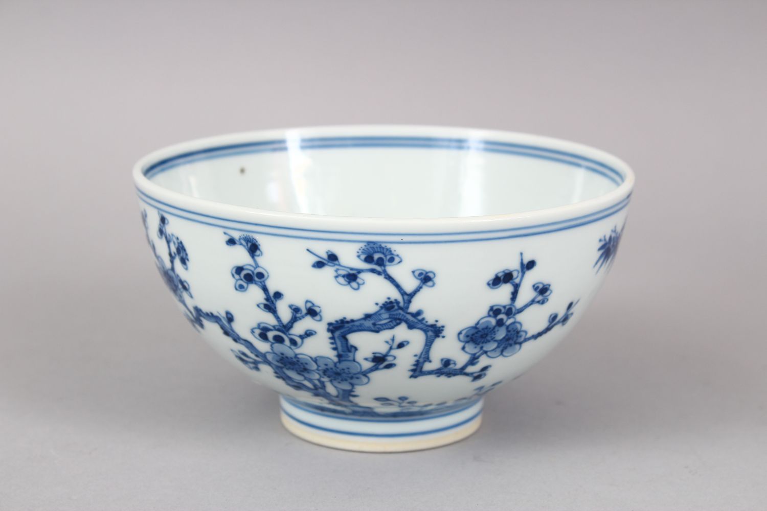 A CHINESE BLUE & WHITE PORCELAIN BOWL, the body with native flora and foliage, the base with a six - Image 3 of 6