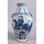 A CHINESE YAN STYLE BLUE & WHITE TWIN HANDLE PORCELAIN VASE, decorated with scenes of a warrior upon