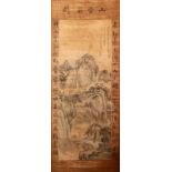 A 20TH CENTURY CHINESE SCROLL PAINTING, a figure standing at the base of a mountainous landscape,