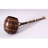 AN UNUSUAL 19TH CENTURY COCONUT WATER SCOOP, with horn handle and bone inlaid decoration, 33cm