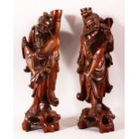A PAIR OF CHINESE CARVED 'ROOTWOOD' FIGURES of fisherman, 35cm high.