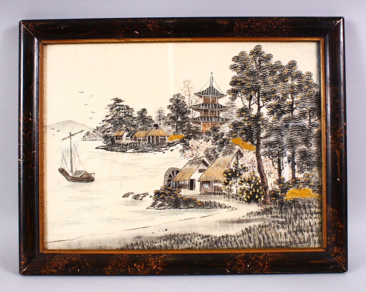 A 20TH CENTURY JAPANESE EMBROIDERED NEEDLE WORK PICTURE OF A LANDSCAPE. 45cm x 35cm.