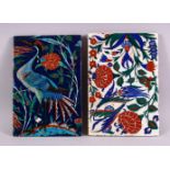 TWO IZNIK TILES, one painted with a heron, one with stylised flowers, both 24cm x 16cm.