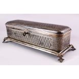 A BIDRI SILVER INLAID RECTANGULAR HINGED CASKET for the European market, with panels of scrolling