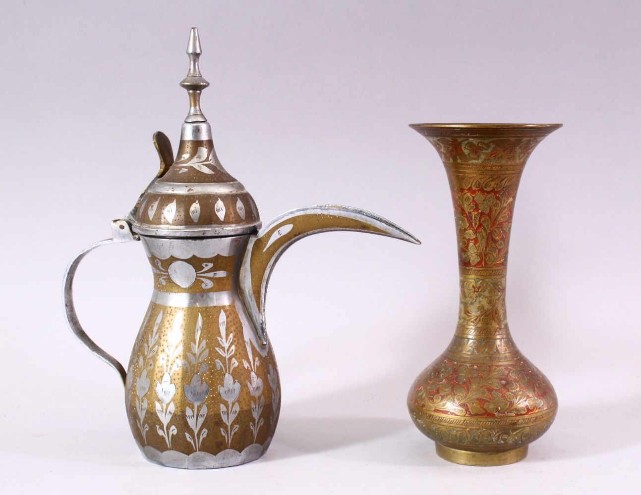 A PERSIAN ENAMEL DECORATED BRASS VASE AND EWER, vase 17cm high.