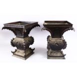 A LARGE & HEAVY PAIR OF JAPANESE BRONZE RELIEF DRAGON VASES, carved in relief with dragons and