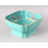 A CHINESE DAOGUANG SQUARE SHAPED BOWL with turquoise ground, the interior painted with figures and