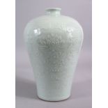 A CHINESE CELADON CARVED PORCELAIN MEIPING LOTUS VASE - FOR THE ISLAMIC MARKET, carved with scenes