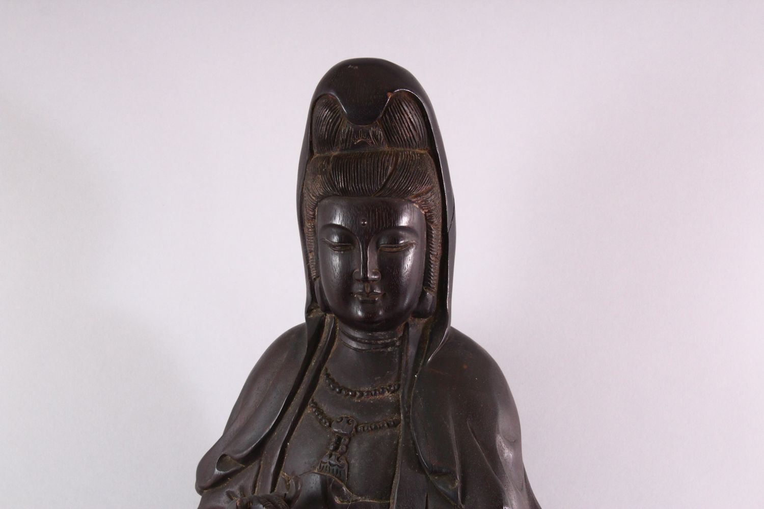 A LARGE 19TH / 20TH CENTURY CHINESE CARVED HARDWOOD FIGURE OF GUANYIN, stood upon a lotus base, - Image 2 of 6