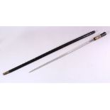 AN INDIAN EBONY, BONE AND HORN MOUNTED SWORD STICK, 91cm long.