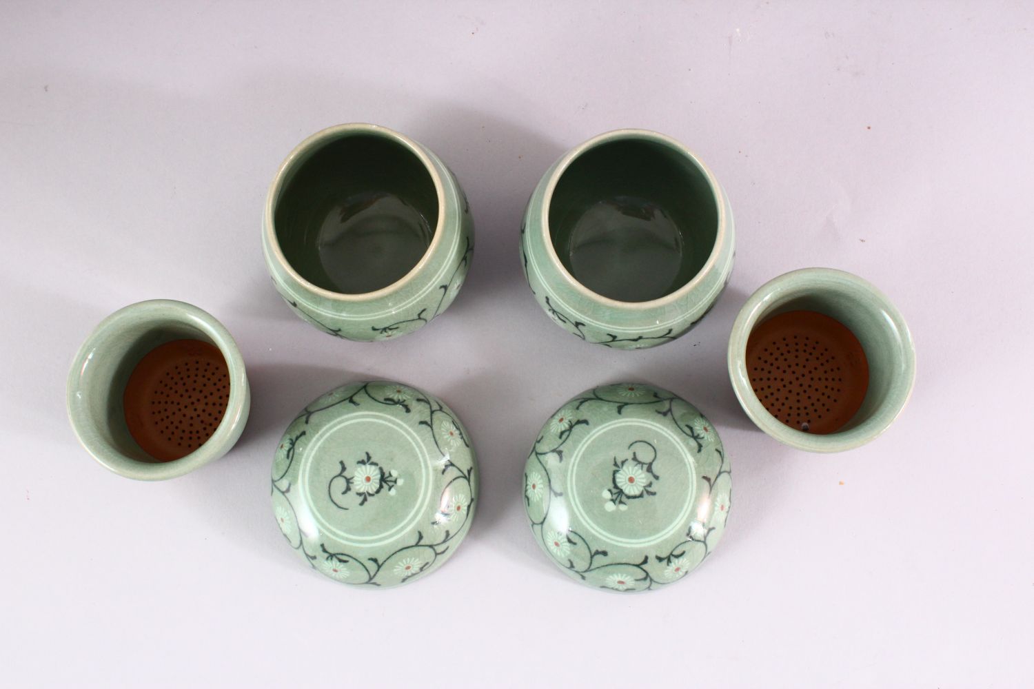 THREE 20TH CENTURY KOREAN CELADON PORCELAIN TEA SET, the body decorated with formal floral - Image 3 of 6