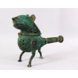 AN ISLAMIC STYLE BRONZE OPENWORK INCENSE BURNER IN THE FORM OF A LION, 40cm.