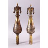 A FINE PAIR OF SILVER GILT JEWISH TORAH POINTERS, with silver overlaid decoration, mounted with