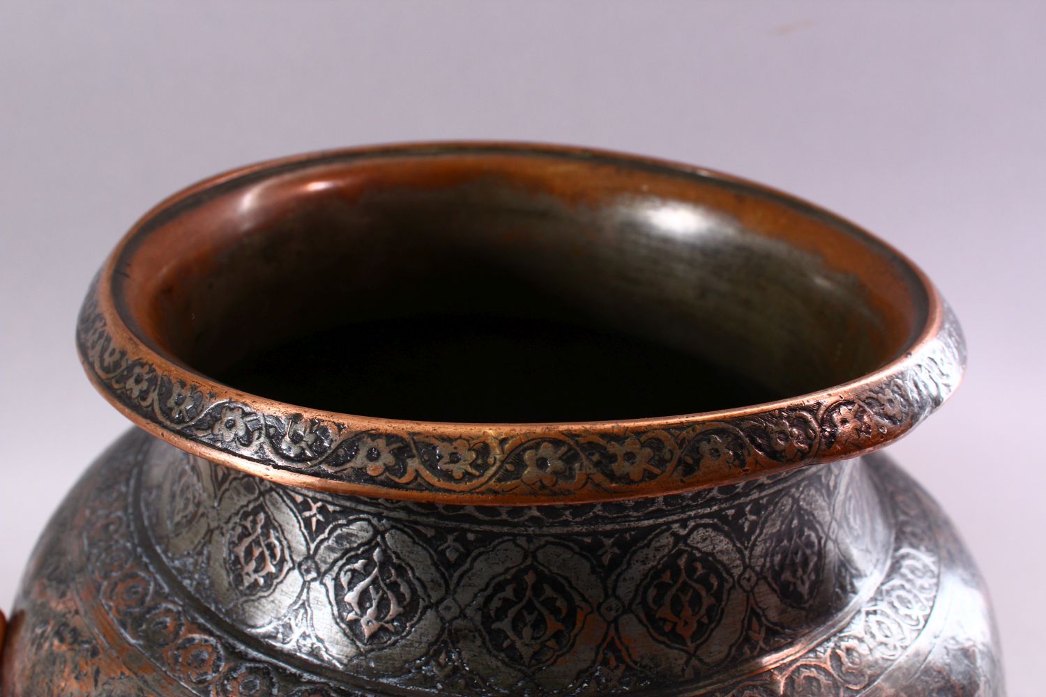 A 17TH CENTURY INDIAN TINNED COPPER LARGE CIRCULAR BOWL, with foliate engraved rim, the neck and - Image 5 of 6