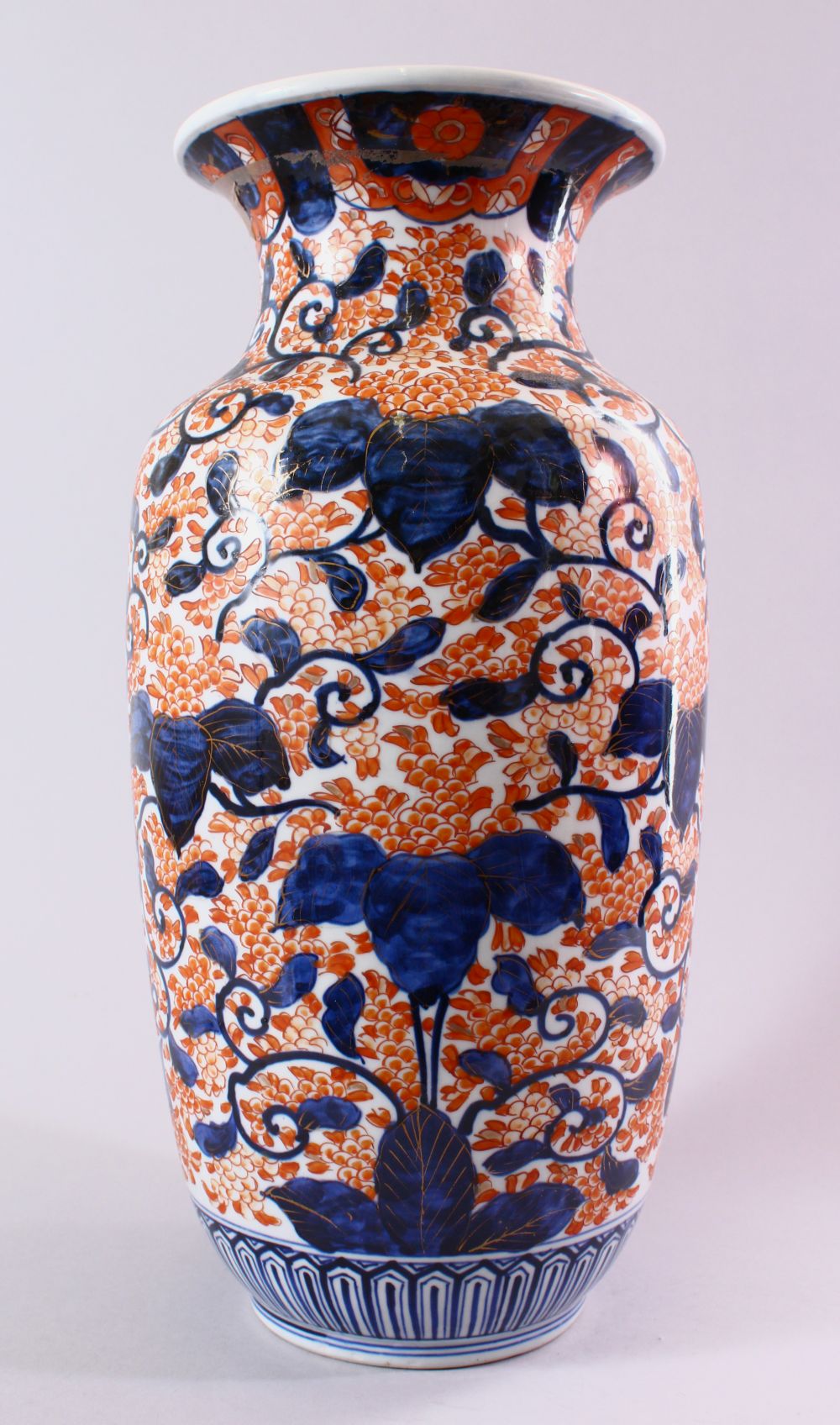 A JAPANESE MEIJI PERIOD IMARI PORCELAIN VASE, decorated with scrolling native flora in typical imari