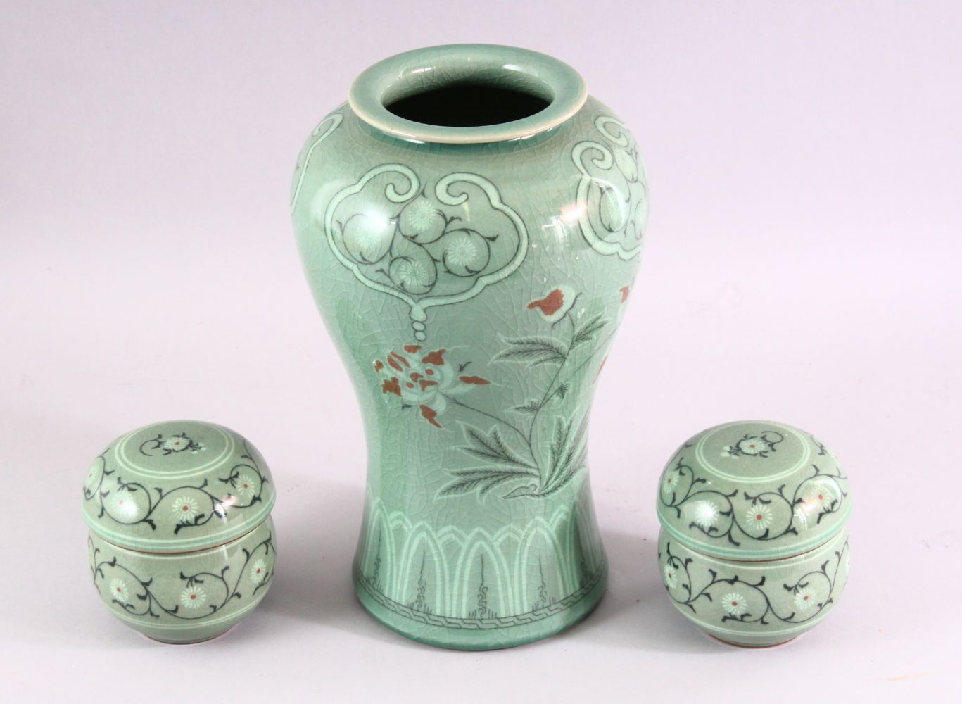 THREE 20TH CENTURY KOREAN CELADON PORCELAIN TEA SET, the body decorated with formal floral