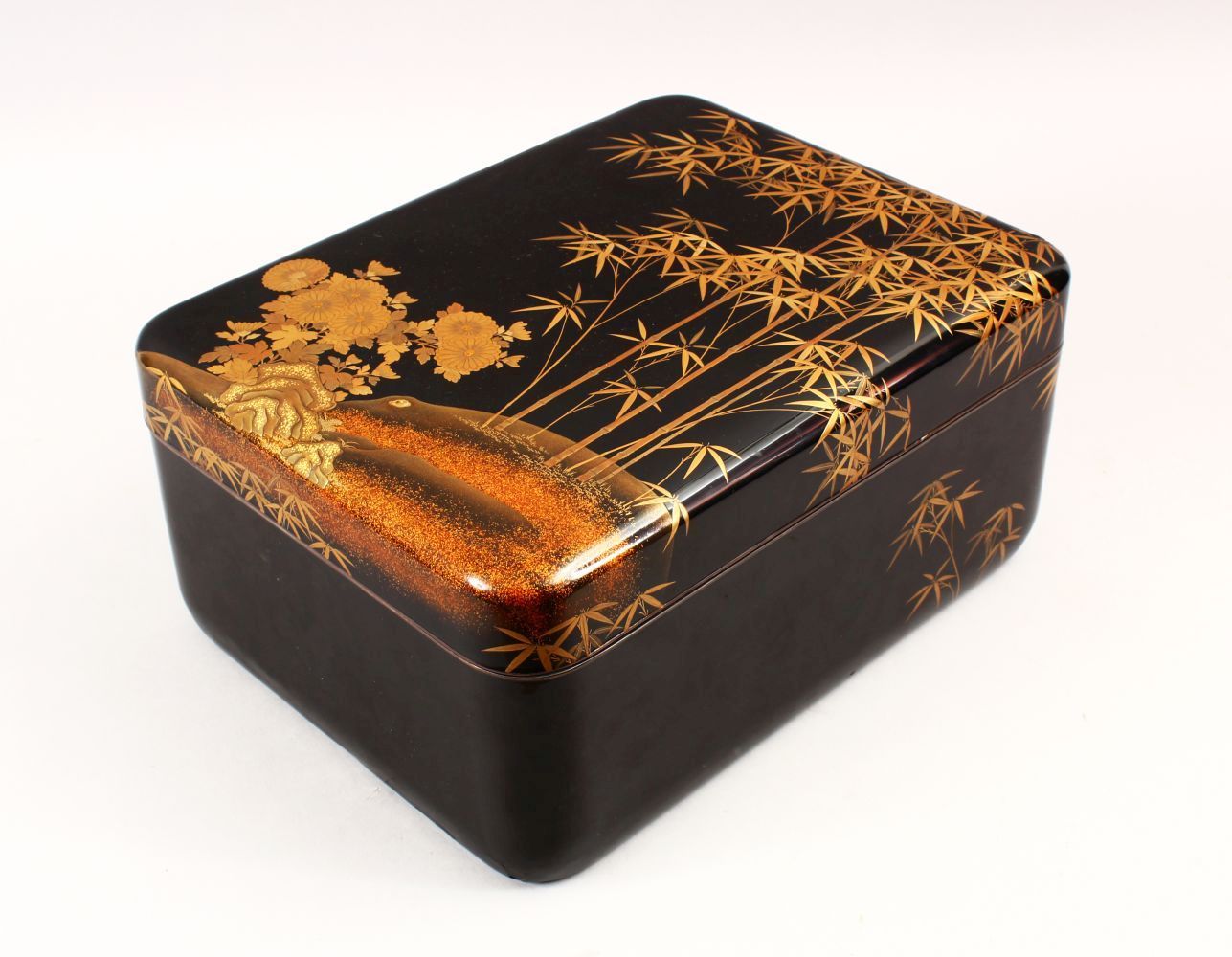 A GOOD JAPANESE MEIJI PERIOD LACQUER & GILT DECORATED LIDDED BOX the box decorated with gold lacquer