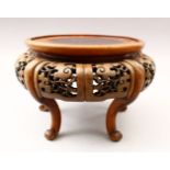 A GOOD 19TH CENTURY CHINESE CARVED AND PIERCED HARDWOOD STAND, stood upon five carved curving