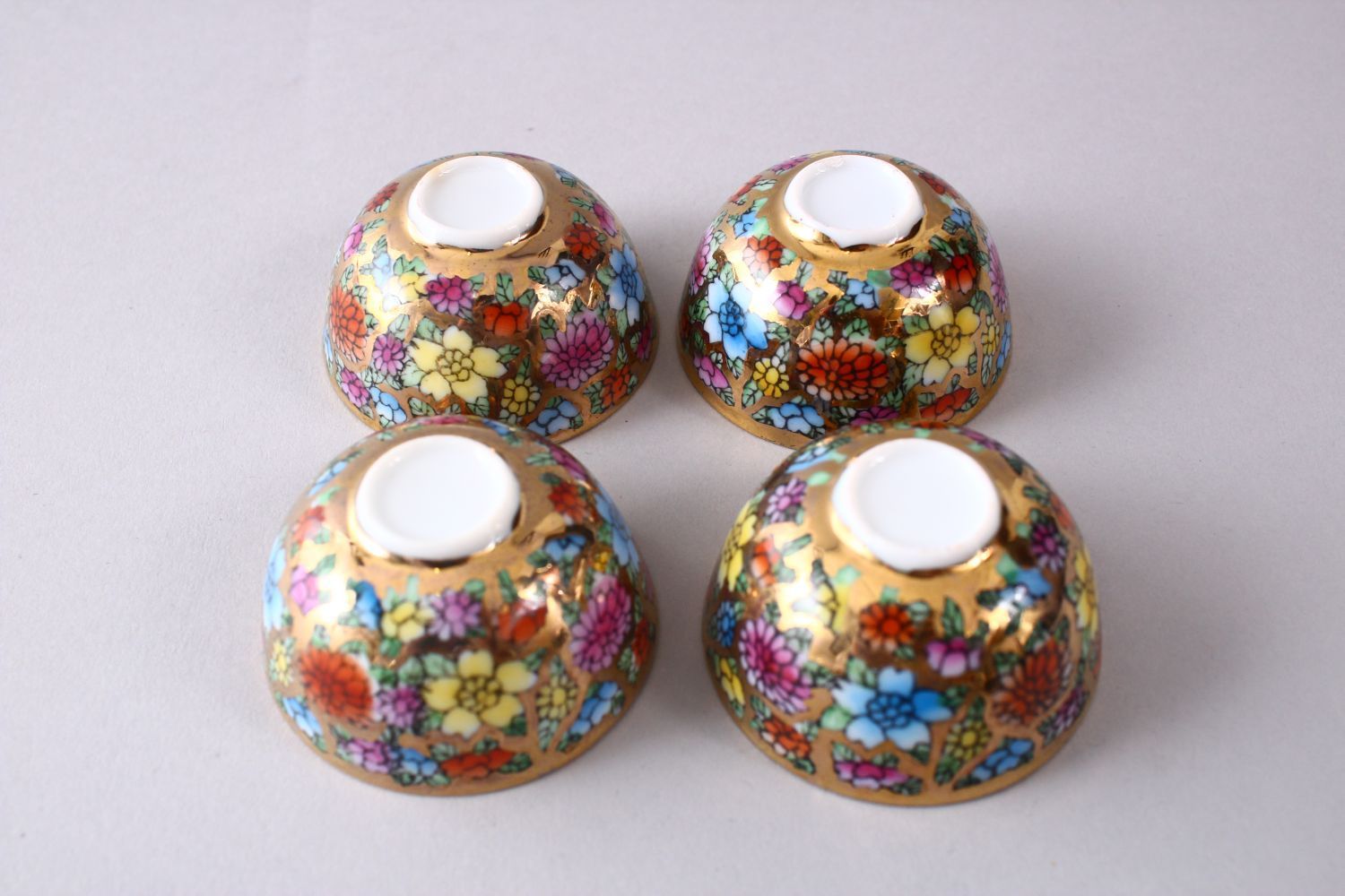 FOUR CHINESE REPUBLIC STYLE PORCELAIN CUPS IN BOX, decorated upon a gilt ground with flora and - Image 4 of 4