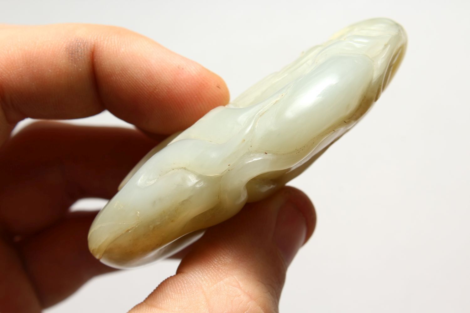 A GOOD CHINESE CARVED JADE PEBBLE OF SHOU LAO, the carving depicting shou lao god of longevity, 7. - Image 5 of 6