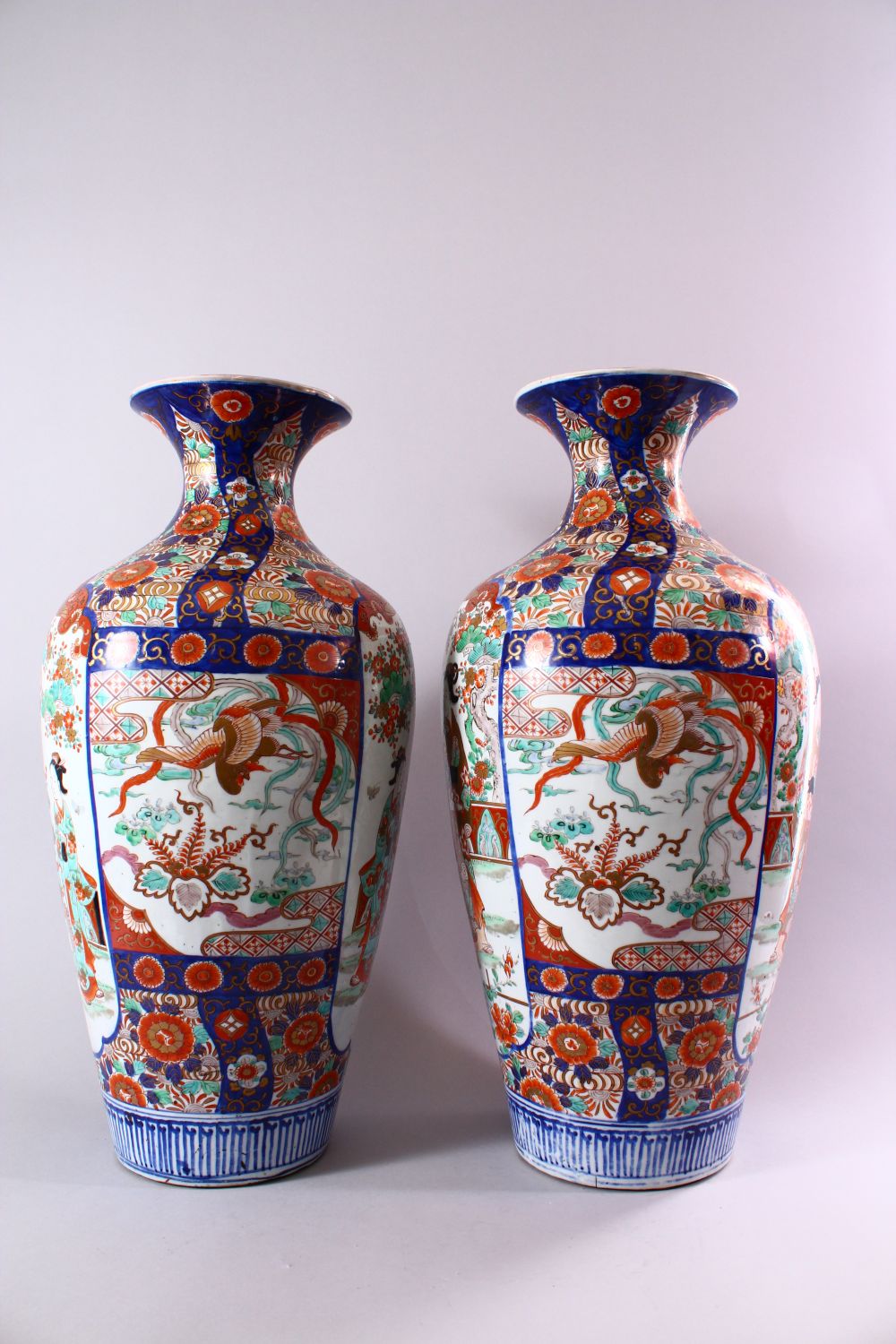 A LARGE PAIR OF JAPANESE MEIJI PERIOD IMARI PORCELAIN VASES, with panel decoration depicting figures - Image 3 of 6