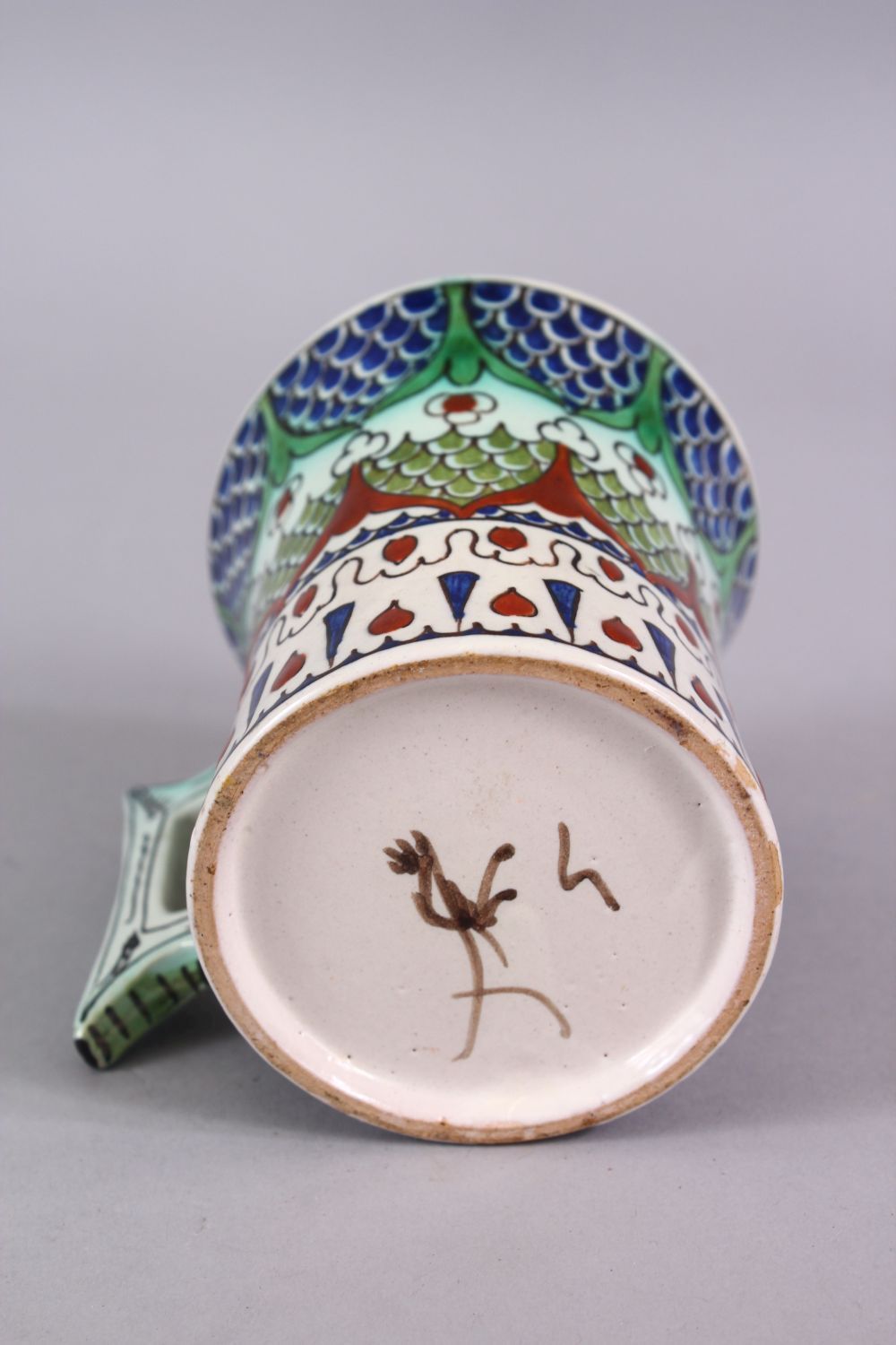 A 19TH CENTURY IZNIK STYLE CANTAGALLI JUG, with floral panel motif, 10cm. - Image 4 of 4