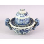 AN UNUSUAL BLUE AND WHITE POTTERY TWIN HANDLED BOWL AND COVER, 10cm high.