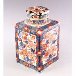 A 19TH CENTURY JAPANESE IMARI SQUARE SHAPED TEA CADDY AND COVER, painted with panels of