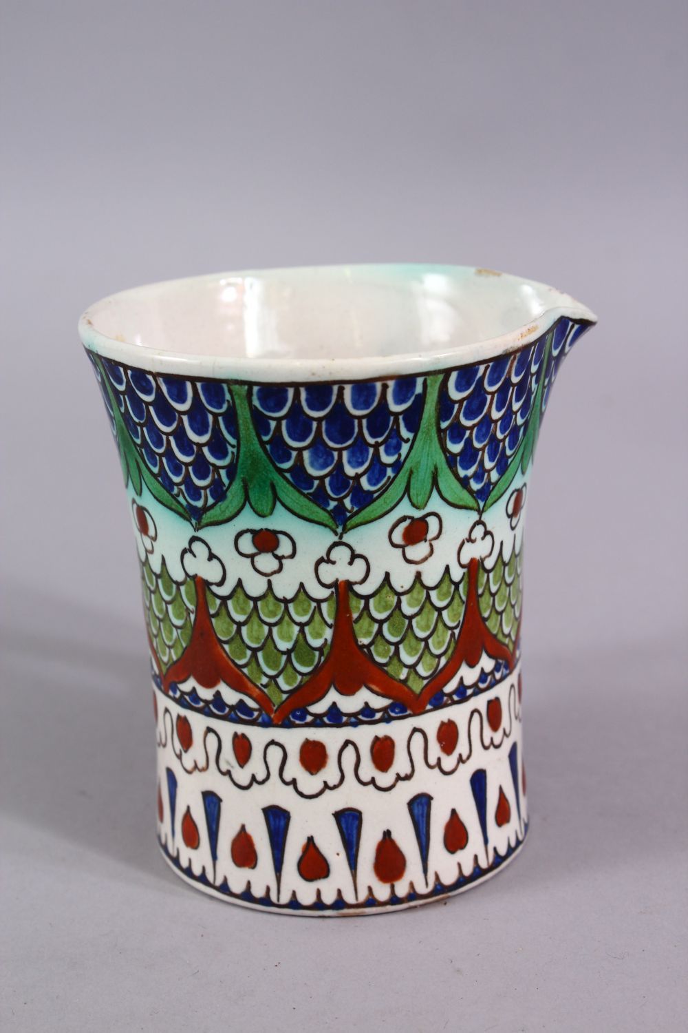 A 19TH CENTURY IZNIK STYLE CANTAGALLI JUG, with floral panel motif, 10cm. - Image 2 of 4