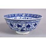 A CHINESE BLUE & WHITE MING STYLE PORCELAIN BOWL, with a central display of lotus, with